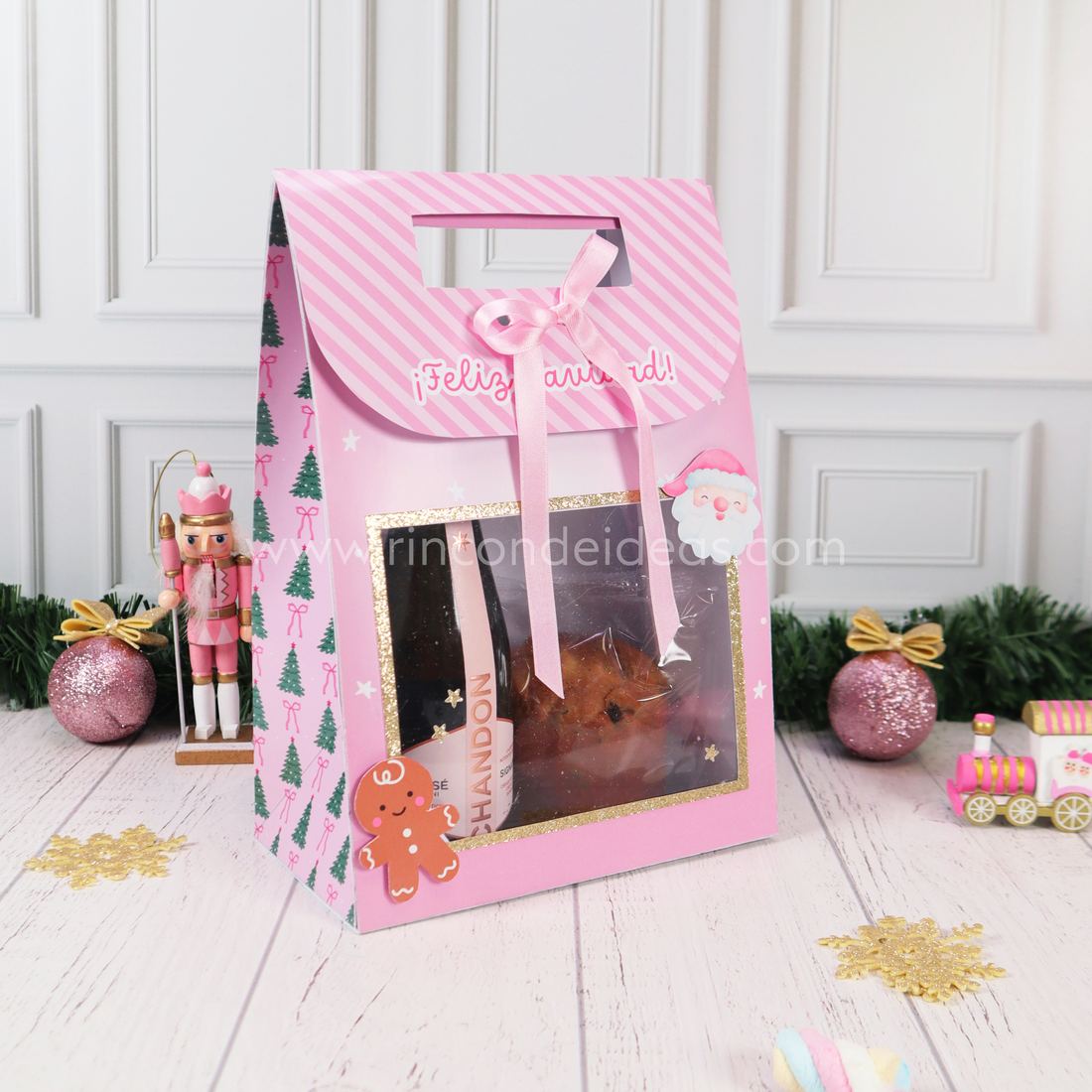 Bolsa con visor rosa para Navidad con manija troquelada, moño de raso y ventana de acetato con borde dorado · Masterclass de Navidad 2026
