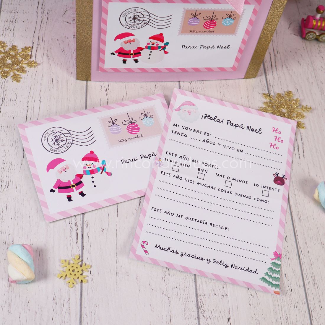Carta para Papá Noel y sobre navideño rosa con muñeco de nieve y estampilla, junto al buzón dorado · Masterclass de Navidad 2026