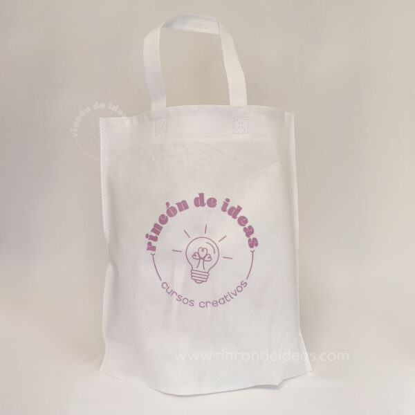 Bolsa de friselina blanca estampada con el logo de la marca · Curso de Sublimación