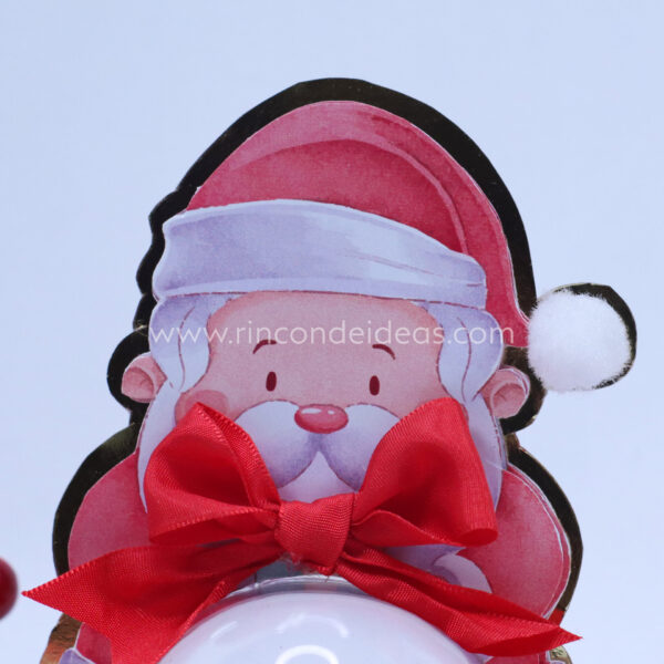 Detalle de la cara de Papá Noel y moño de raso rojo · Masterclass de calendarios de adviento, esferas y topper