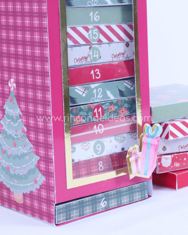 Cajones numerados de la torre con estampado navideño · Masterclass de calendarios de adviento, esferas y topper