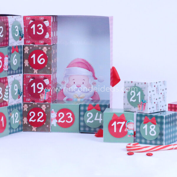 Calendario abierto con fondo de Papá Noel y cajitas sueltas · Masterclass de calendarios de adviento, esferas y topper