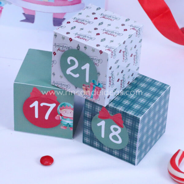 Tres cajitas del calendario apiladas: 17, 18 y 21 · Masterclass de calendarios de adviento, esferas y topper