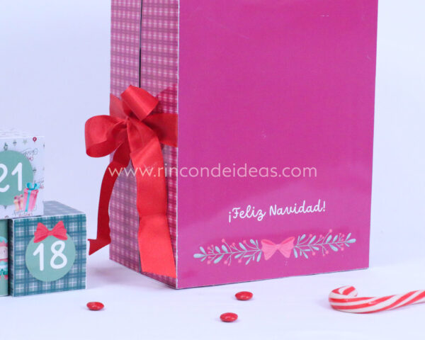 Dorso del calendario con Feliz Navidad y moño rojo · Masterclass de calendarios de adviento, esferas y topper
